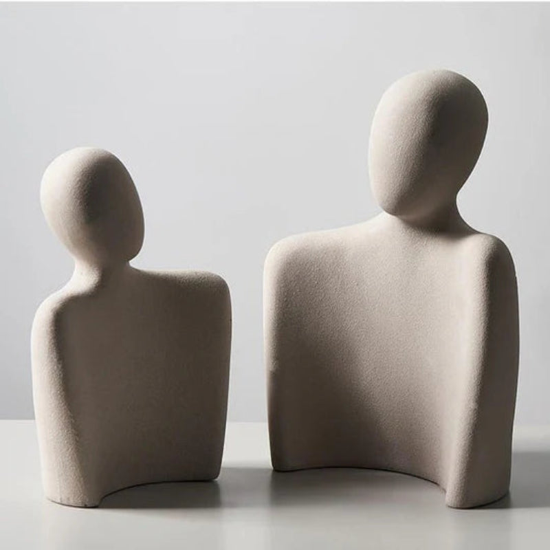 Modern sculpture symbolizing connection and tenderness