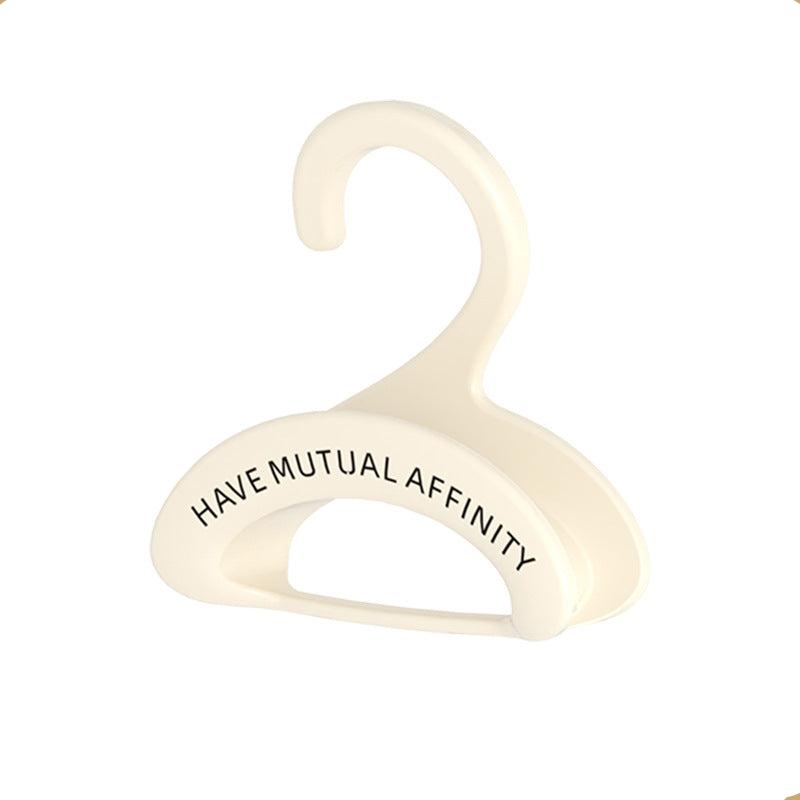 Fiksut koukut laukkujen ripustamiseen ilman vaurioita