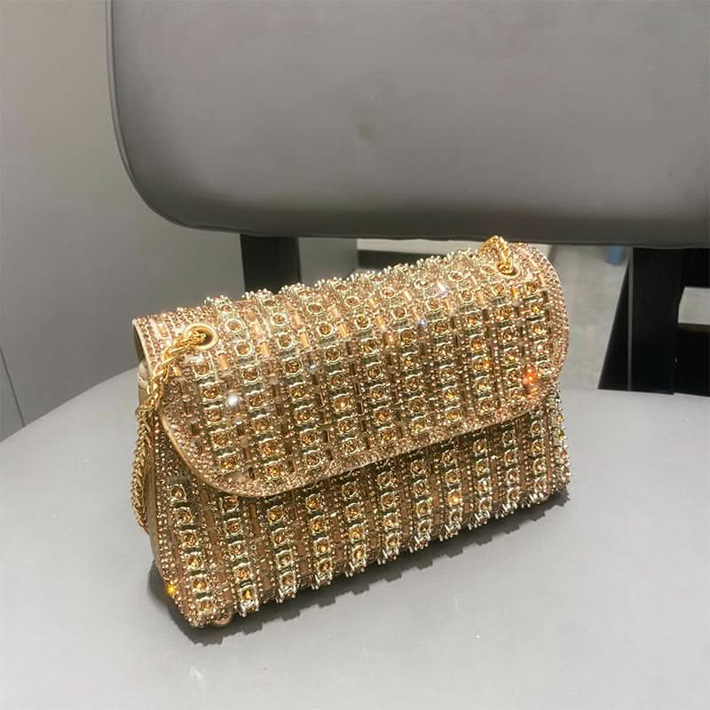 Stralen in de avond met deze glamoureuze clutch met strass 