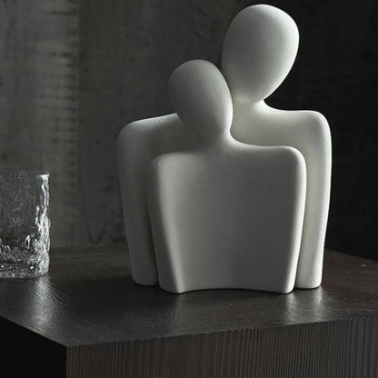 Modern sculpture symbolizing connection and tenderness 